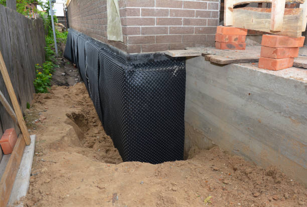 Happy homeowners after waterproofing job in Newfoundland